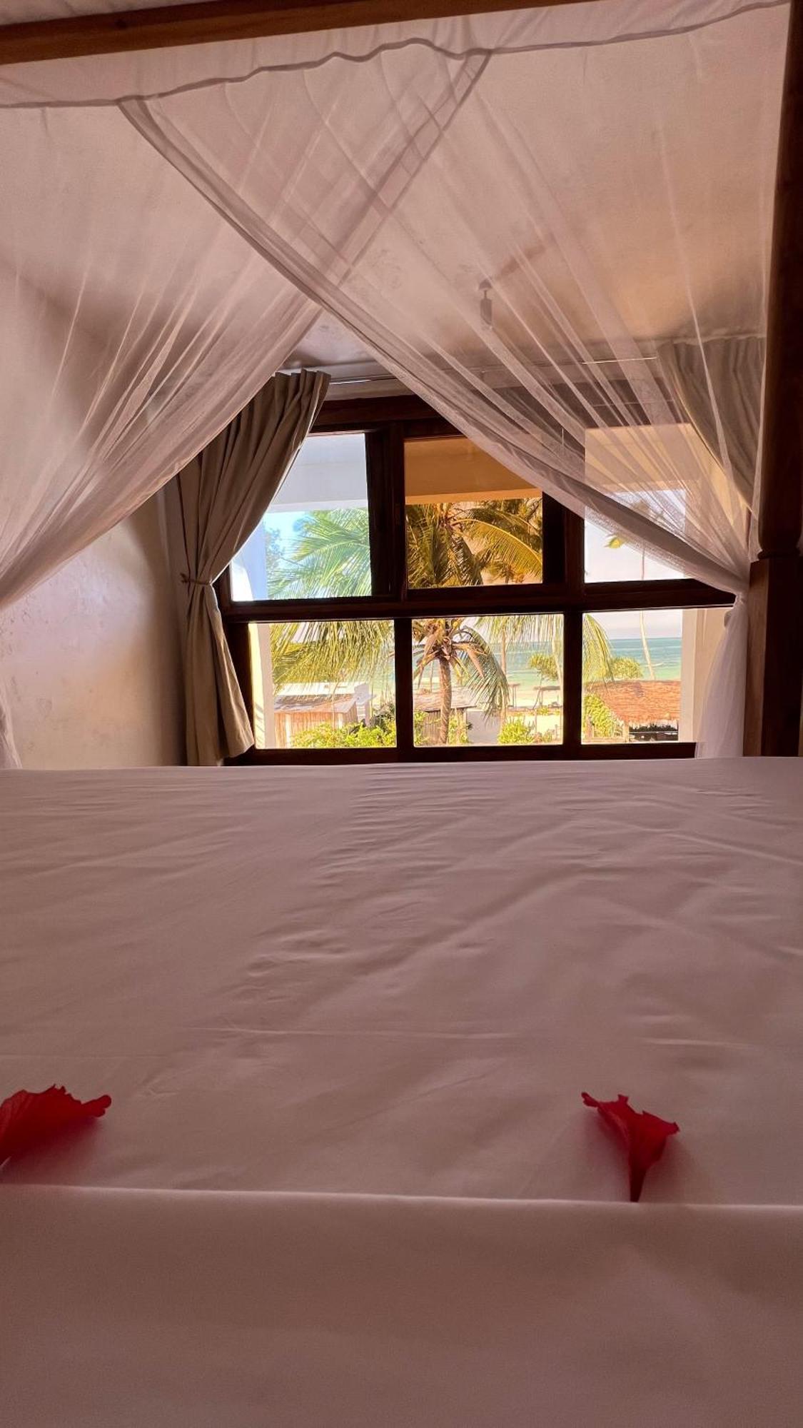Mvuvi Boutique Resort Kiwengwa  Habitación foto
